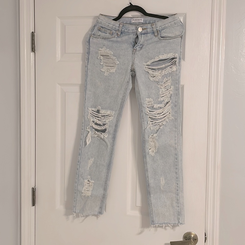 Light ripped blue jeans, low waist,